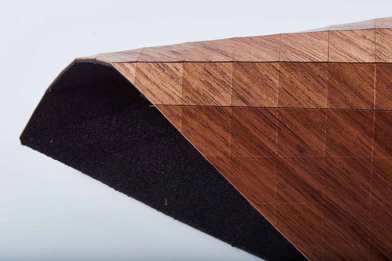 Flexible wood textile with geometric patterns for sustainable design, fashion accessories and interior applications.